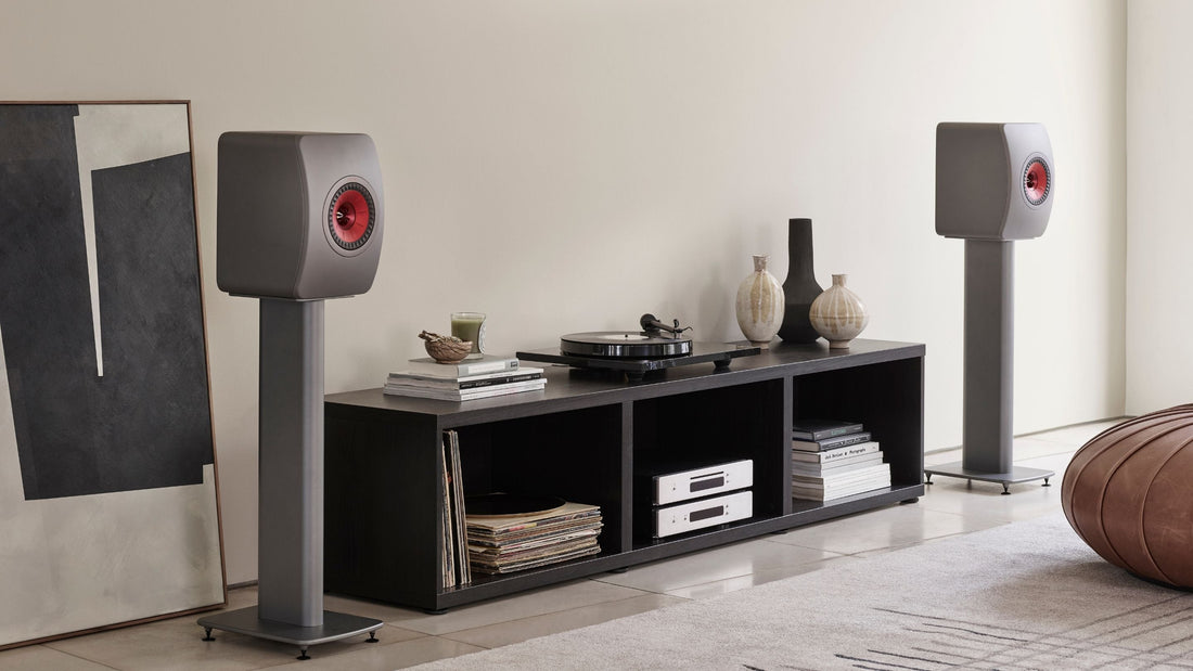 KEF LS50 Meta HiFi speakers mounted to S2 Floor stand placed between low sideboard unit