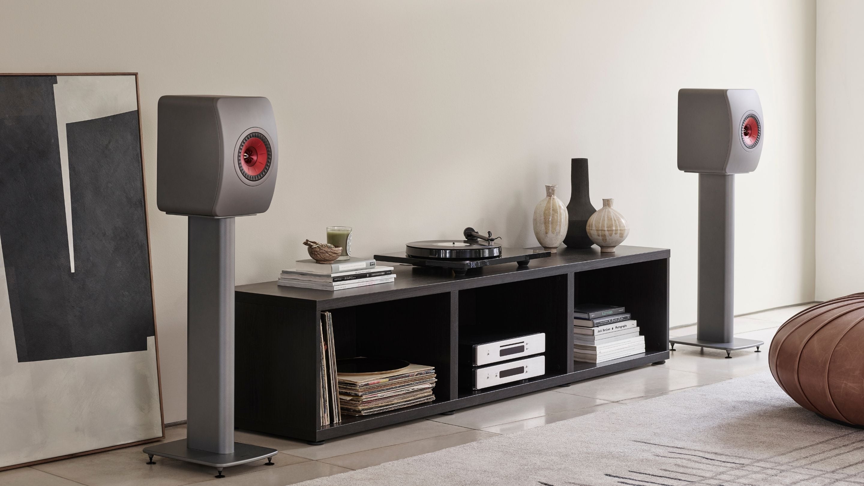 KEF LS50 Meta HiFi speakers mounted to S2 Floor stand placed between low sideboard unit